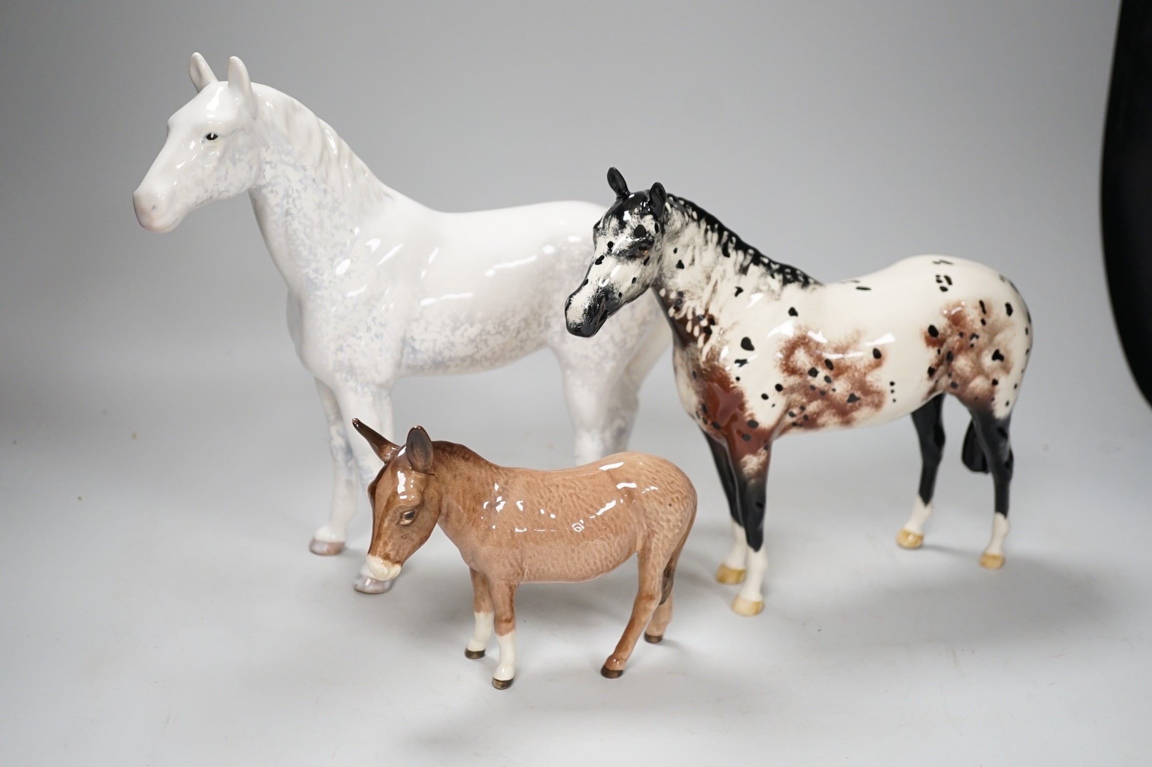 Three ceramic horse models, to include Beswick, Doulton, Sylvac, tallest 23cm